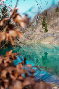 Beautiful blue mountain lake. The Blue Colour is caused by former limestone mining. (Blauer See, Rübeland, Hüttenrode near Blankenburg, National Park Harz in Germany Beautiful blue mountain lake. The Blue Colour is caused by former limestone mining. (Blauer See, Rübeland, Hüttenrode near Blankenburg, National Park Harz in Germany